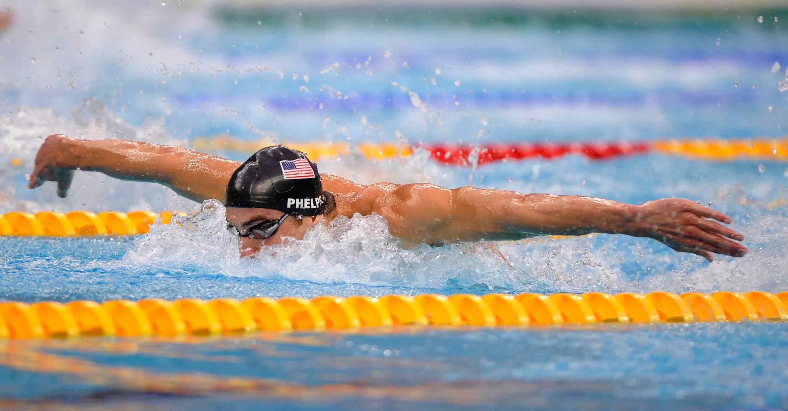Michael Phelps swimming in the Olympics.